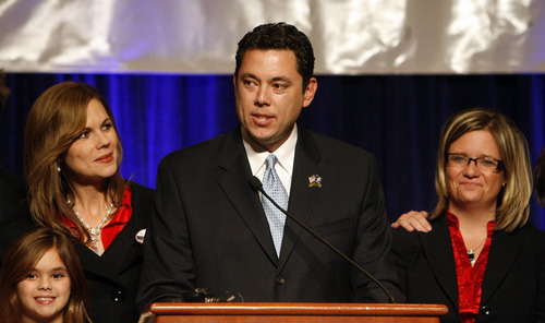 Congressman Jason Chaffetz is flanked by wife Julie and daughter Kate, 7, left, and campaign manager Jennifer Scott, right, as he addressed supporters during election night celebrations at the Utah Republican Party headquarters at the Grand America Hotel in Salt Lake City on November 4, 2008.  Steve Griffin/Salt Lake Tribune file photo