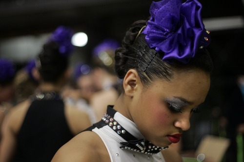 Kim Raff |The Salt Lake Tribune
Tatiana Lanier of Cottonwood High School gets ready back stage before performing during the 5A Drill Team state championship at Utah Valley University in Orem, Utah on February 3, 2012.