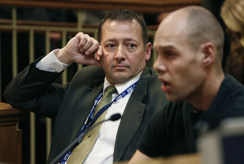 Scott Sommerdorf  |  The Salt Lake Tribune             
Rep. Paul Ray, R-Clearfield, looks over at Zachary Wellman, a Utah resident testifying on Ray's HB49  -- prohibiting police from charging disorderly conduct for simply openly carrying guns.