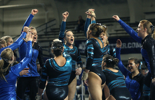 Scott Sommerdorf  |  The Salt Lake Tribune             
The BYU Cougars gymnastics team cheers prior to the last event as Boise State defeated BYU 195.750 to 194.750 in women's gymnastics, Saturday February 4, 2012.