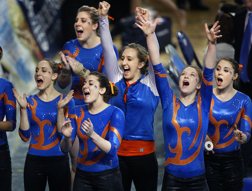 Scott Sommerdorf  |  The Salt Lake Tribune             
The Boise State Broncos team cheers for Brittany Potvin-Green as she vaults. Boise State defeated BYU 195.750 to 194.750 in women's gymnastics, Saturday February 4, 2012.