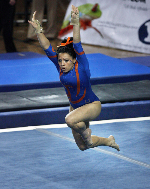 Scott Sommerdorf  |  The Salt Lake Tribune             
Boise State's Amanda Otuafi competes in the floor exercise as Boise State defeated BYU 195.750 to 194.750 in women's gymnastics, Saturday February 4, 2012. Otuafi scored a 9.50 in the event to help the Broncos to the win.