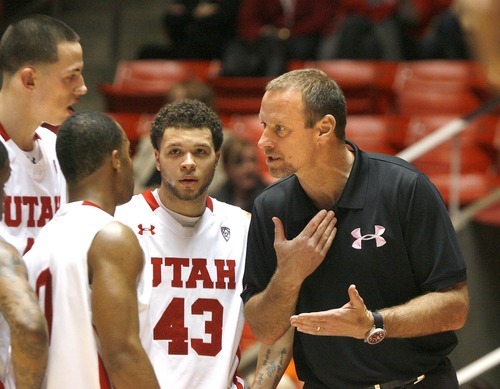 Paul Fraughton | The Salt Lake Tribune.
Utah coach Larry Krystkowiak  talks to his players during a time out. Oregon defeated Utah 68 to 79 in The Huntsman Center.
 Thursday, February 2, 2012