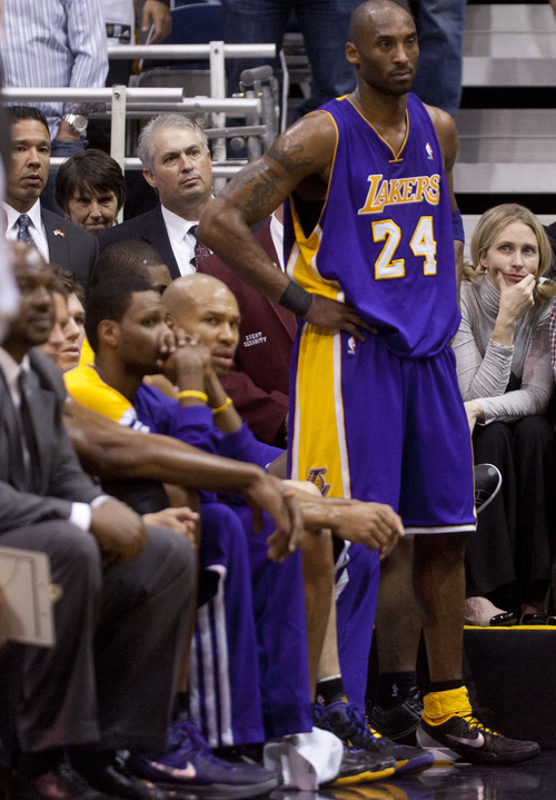 Trent Nelson  |  The Salt Lake Tribune
Los Angeles Lakers' Kobe Bryant (24) on the bench as time runs out and Utah wins. Utah Jazz host the Los Angeles Lakers, NBA basketball Saturday at EnergySolutions Arena in Salt Lake City.