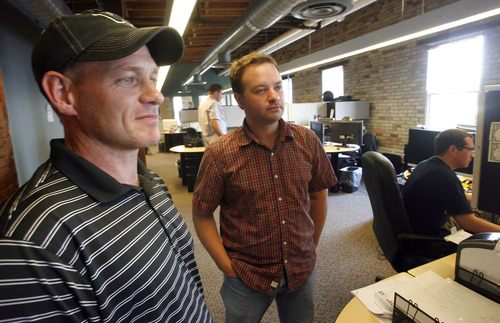 David Jaffe, right,  one of the most well known video game makers in the world, and Scott Campbell, left, who used to head one of Sony's video game studios here in salt lake city, are starting a new video game studio here in Salt Lake City to make games for the PlayStation 3.   They have set up a studio in the Salt Lake Hardware Building.    Al Hartmann/Salt Lake Tribune   8/3/07