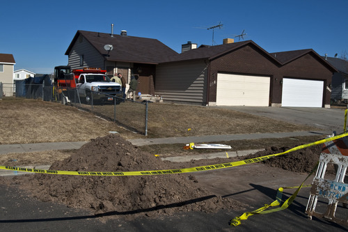 Chris Detrick  |  The Salt Lake Tribune
Layton police search search the property around a home in Roy for evidence in the disappearance of Victor Flores Tuesday February 7, 2012. Layton police Lt. Travis Lyman confirmed that the property at 3812 West 4550 South was being excavated in hopes of turning up 