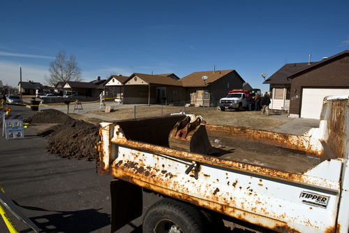 Chris Detrick  |  The Salt Lake Tribune
Layton police search search the property around a home in Roy for evidence in the disappearance of Victor Flores Tuesday February 7, 2012. Layton police Lt. Travis Lyman confirmed that the property at 3812 West 4550 South was being excavated in hopes of turning up 
