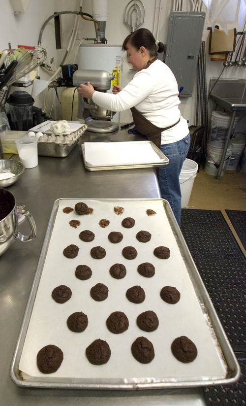 Paul Fraughton  |  The Salt Lake Tribune
Romina Rasmussen of Les Madeleines makes the filling for her chocolate whoopie pies, foreground.