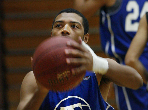 Scott Sommerdorf  |  The Salt Lake Tribune             
Sidney Freeman, #23, during a shooting drill at Taylorsville High basketball practice, Saturday February 4, 2012.