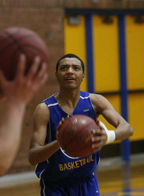 Scott Sommerdorf  |  The Salt Lake Tribune             
Sidney Freeman, #23, during a shooting drill at Taylorsville High basketball practice, Saturday February 4, 2012.