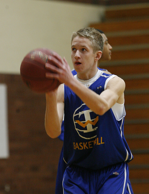 Scott Sommerdorf  |  The Salt Lake Tribune             
Jevin Warren, #30, during a shooting drill at Taylorsville High basketball practice, Saturday February 4, 2012.