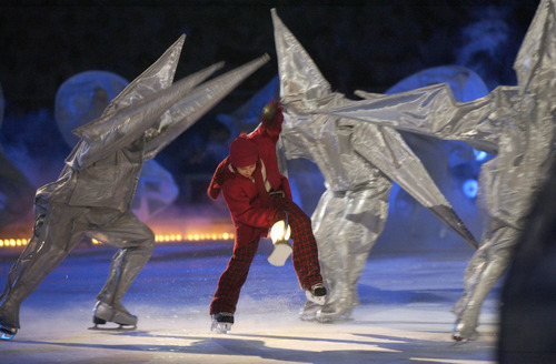 Rick Egan  |  The Salt Lake Tribune file photo

Costumed skaters perform during the Opening Ceremony at Rice-Eccles Stadium.
