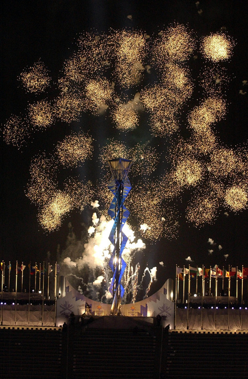 Steve Griffin  |  The Salt Lake Tribune file photo
Fireworks explode above the Olympic cauldron at Rice-Eccles Stadium.