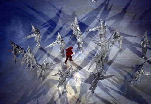 Trent Nelson | The Salt Lake Tribune file photo
Costumed skaters perform during the Opening Ceremony at Rice-Eccles Stadium.