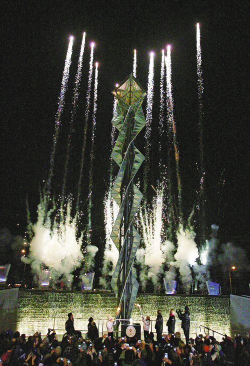 Steve Griffin  |  The Salt Lake Tribune

 Fireworks shoot into the air around the Olympic Caldron during a  relighting ceremony marking the 10th anniversary of the start of the 2002 Winter Games at Rice Eccles Stadium in Salt Lake City, Utah  Wednesday, February 8, 2012. The caldron was supposed to light as the fireworks shot off but problems with the caldron delayed the lighting for several minutes.