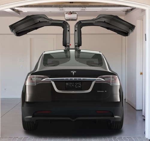 Tesla Motors Shows Off Its Future Suv With Gull Wing