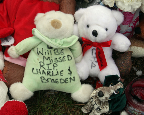 Rick Egan  | The Salt Lake Tribune 

Stuffed animals, balloons, and children's toys such as Pokémon cards make up a memorial near the home where Josh Powell took his life and the lives of Charlie and Braden, in Graham, Washington, Wednesday, February 8, 2012.