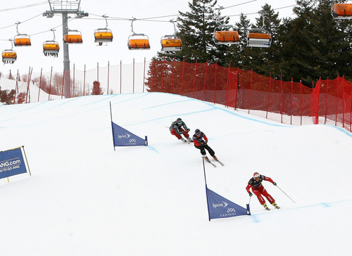 Scott Sommerdorf  |  The Salt Lake Tribune             
Skicross racers turn for the final jump in a men's heat at The Canyons, Saturday February 11, 2012.