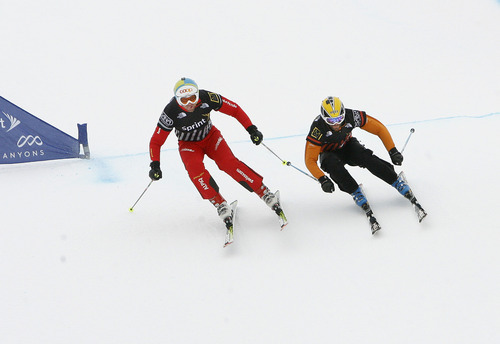 Scott Sommerdorf  |  The Salt Lake Tribune             
American Robert Mahre (right), leads Swiss skiier Phillip Gasser to the sprint to the final jump of heat 6 on the Men's Skicross event at The Canyons, Saturday February 11, 2012.