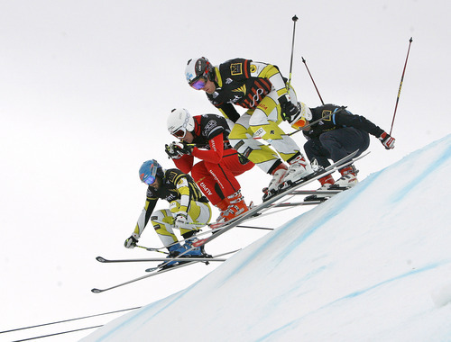 Scott Sommerdorf  |  The Salt Lake Tribune             
Men's winner Christopher Del Bosco (foreground) leads over the first jump in the Men's Skicross semi-final at The Canyons, Saturday February 11, 2012. From left to right are: Stanislas Rey who finished third, Peter Staehli, Delbosco, and Joe Swensson. Canadian men swept the winners podium at the event. Joe Swensson was the top American finisher at sixth place.