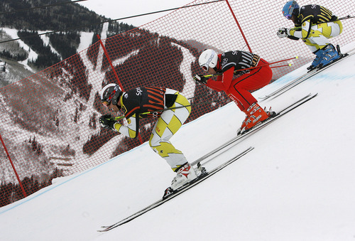 Scott Sommerdorf  |  The Salt Lake Tribune             
Men's winner Christopher Delbosco leads Peter Staehli and Stanislas Rey through the first jump of the Men's Skicross at The Canyons, Saturday February 11, 2012. Delbosco won the event with fellow Canadian Rey in third.