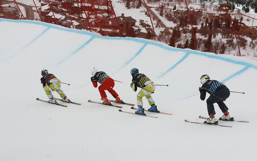 Scott Sommerdorf  |  The Salt Lake Tribune             
Men's semi-final skiiers led by winner Christopher Delbosco, round the first turn at the start of the skicross at The Canyons, Saturday February 11, 2012.