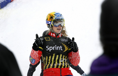 Scott Sommerdorf  |  The Salt Lake Tribune             
Women's Snowboardcross winner Dominique Maltais celebrates her win in the Women's Snowboardcross at the U.S. Grand Prix held The Canyons, Sunday February 12, 2012.
