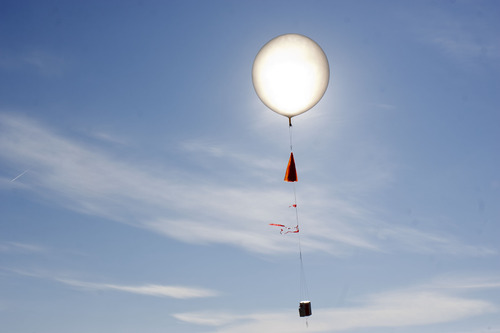 Trent Nelson  |  The Salt Lake Tribune
Russ Schnell, a Deputy Director with the NOAA, demonstrated a balloon used to check air quality as government agencies and and industry announced the Uintah Basin Winter Ozone Study Tuesday, February 7, 2012 in Vernal, Utah. The study intends to better understand why ozone levels occasionally soar above health-based standards in the winter.