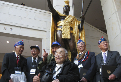 Kevin Carney  |  Special to The Salt Lake Tribune
Noel Okamoto, pointing, jokes around with Ted Shimizu, seated, after both Utahns received the Congressional Gold Medal at the U.S. Capitol Visitors Center on Wednesday. Utahns Maseo Akiyama and Masami Hayashi, on the left, and Roy Tsuya and Nelson Akagi, on the right, were also awarded the nation's top civilian honor.