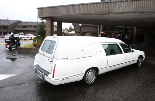 Rick Egan  | The Salt Lake Tribune 
The hearse arrives at the the funeral for Charlie and Braden Powell at the Life Center Church in Tacoma, Wash., on Saturday.