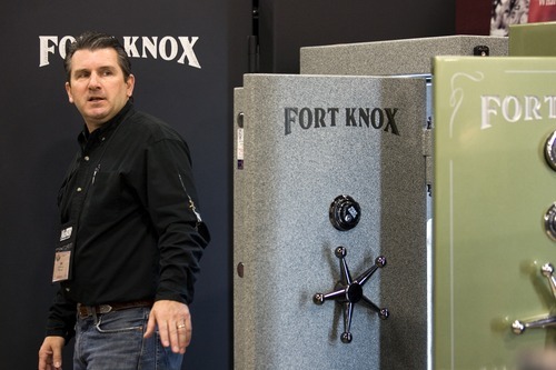 Vice President of Fort Knox, Bill James, speaks with customers at the Western Hunting and Conservation Expo on Sunday, February 12, 2012 at the Salt Palace in Salt Lake City. Fort Knox is a company who manufactures gun safes based in Orem.
ASHLEY FRANSCELL/Special to The Salt Lake Tribune