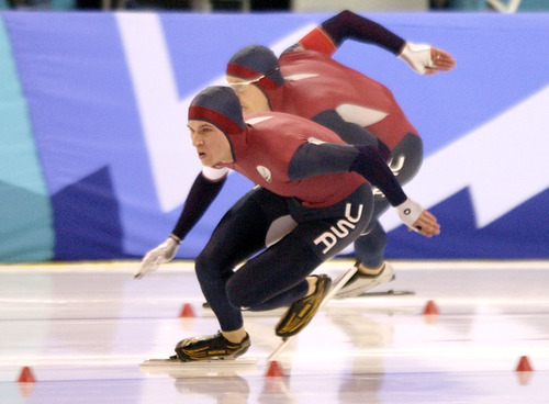 Steve Griffin | Tribune file photo
Speedskater Kip Carpenter leads American teammate Casey Fitzrandolph into the first turn of the men's 500 meters at the Utah Olympic Oval, where he earned the bronze medal and Fitzrandolph won gold.