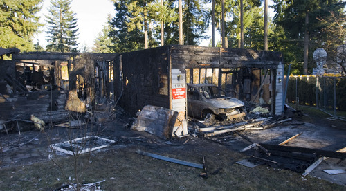 Al Hartmann  |  The Salt Lake Tribune
Scene on Monday February 6 of the burned out home where Josh Powell commited suicide and killed his two children in a house fire on Sunday in Puyallup, Washington.