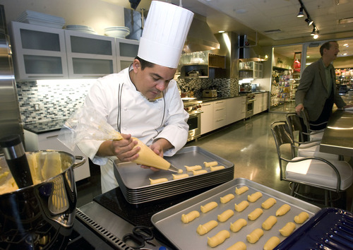 Al Hartmann  |  The Salt Lake Tribune file photo

Harmons will feature trained chefs such as Adalberto Diaz, who will teach cooking classes. The store also has obtained a limited liquor license to teach wine- and cheese-tasting classes. The downtown Salt Lake City store opened on Wednesday.