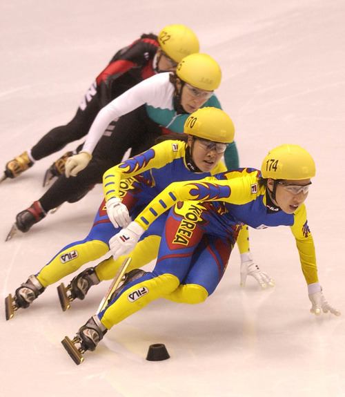 Leah Hogsten | Tribune file photo
Korea's Ko Gi-hyun leads teammate Choi Eun-kyung in the final of the women's 1,500-meter short-track speedskating final at the Delta Center, with Bulgaria's Evgenia Radanova in third place and China's Yang Yang (A) in fourth.