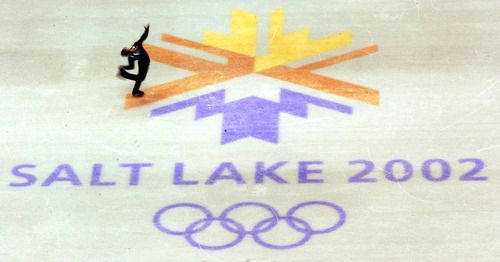 Leah Hogsten | Tribune file photo
Ukraine's Dmitri Dmitrenko performs during the men's figure skating free program at the Delta Center.