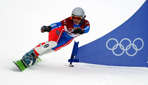 Rick Egan | Tribune file photo
France's Isabella Blanc -- the eventual gold medalist -- speeds to one of the best times in qualifying for the wmen's snowboarding parallel giant slalom at Park City Mountain Resort.