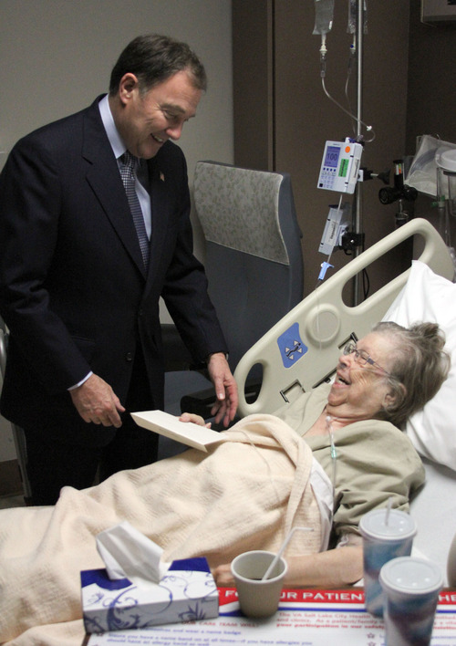 Francisco Kjolseth  |  The Salt Lake Tribune
Gov. Gary Herbert visits with Birdie Lucille Fukawa, 87, a WWII Navy nurse from Taylorsville at the VA Hospital on Tuesday, February 14, 2012. As a part of the 