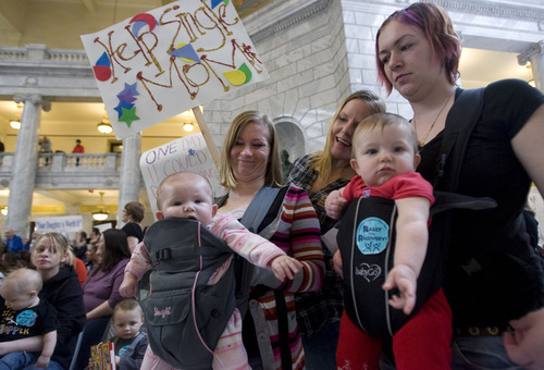 Al Hartmann  |  The Salt Lake Tribune
Mothers with their children were among the nearly 400 people joining a rally in the Capitol seeking more funds for substance abuse treatment and prevention.
