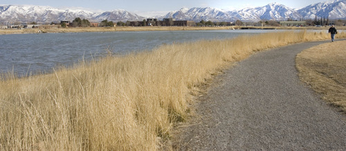 Paul Fraughton | The Salt Lake Tribune
A walker makes his way along the Decker Lake Trail.