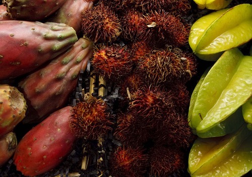 Leah Hogsten  |  The Salt Lake Tribune
From left, cactus pear, rambutan and star fruit. The new Harmons grocery opened Wednesday in downtown Salt Lake City. The store at 100 S. 135 East was built on two levels. A 50,000-square-foot ground level features a large produce department and meat counter with fresh fish. On the 18,000-square-foot mezzanine there is a deli with a seating capacity for about 300 customers.
