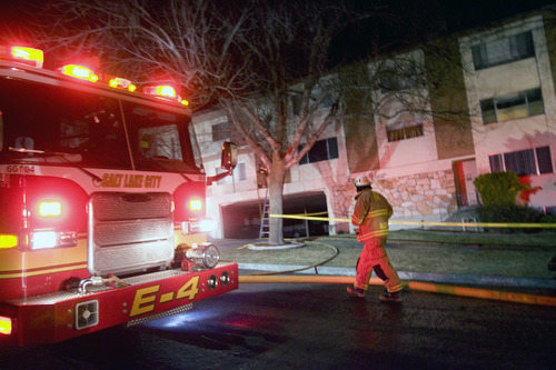 Kim Raff  |  The Salt Lake Tribune
Firefighters work to put out a fire at the Fountain View apartment complex on F Street in Salt Lake City, Utah on February 16, 2012.