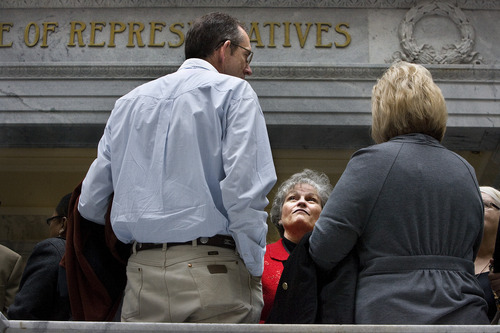Scott Sommerdorf  |  The Salt Lake Tribune             
Rep. Ronda Rudd Menlove, R-Garland, listens to lobbyists in the lobby area outside the Utah Senate, Friday February 17, 2012.