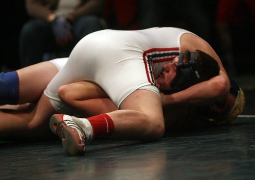 Kim Raff  |  The Salt Lake Tribune
Cassidy Smith of Altamont pins Cameron Wilkerson of Duchesne in the 1A 285 lb match during the State Wrestling Tournament finals at Utah Valley University in Orem, Utah on February 18, 2012.