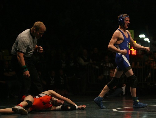 Kim Raff  |  The Salt Lake Tribune
Jory Owens of Panguitch celebrates defeating Hunter Bowring of Monticello in the 113 lb 1A State Wrestling Tournament finals at Utah Valley University in Orem, Utah on February 18, 2012.