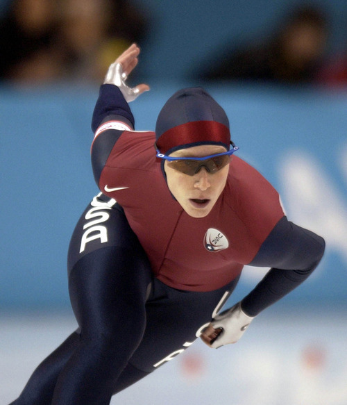 Steve Griffin | Tribune file photo
Speedskater Chris Witty of the United States rounds the corner, on her way to gold medal and world record in the women's 1,000 meters at the Utah Olympic Oval.