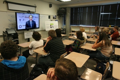 Paul Fraughton  |  Tribune file photo
Gov. Gary Herbert, using interactive video conferencing technology, delivers a speech to high school students in their classroom at Murray High School Oct. 12. Other high schools around the state were part of the network receiving the governor's message. The message, originating from Blanding, Utah, was the key to a good future is a good education.