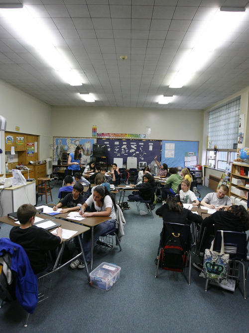 Francisco Kjolseth  |  Tribune file photo
Angela Huntsman's sixth-graders have class in their outdated classroom at Midvale Elementary on March 30, 2010. Canyons School District could place up to $250 million bond on the June 22 ballot to pay to renovate or rebuild a number of schools. One of the first to rebuild would be Midvale Elementary School. The school turns 60 years old on April 20 and has had a substantial renovation.