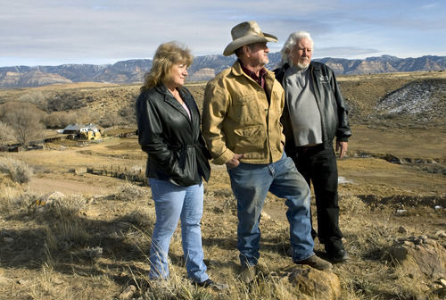 Al Hartmann  |  The Salt Lake Tribune
Janice Hunt, left, Kent Pilling and Bob Warren,  long time East Carbon residents are rallying against city officials for failing to resist PCB's to be buried at the landfill southeast of town.   State regulators are poised to allow PCB waste to be buried at ECDC Environmental's landfill.    Pilling's Big Spring Ranch lies in the shallow valley below the landfill.