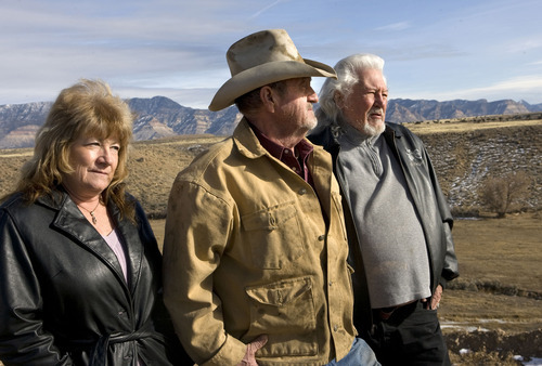 Al Hartmann  |  The Salt Lake Tribune
Janice Hunt, left, Kent Pilling and Bob Warren,  long time East Carbon residents are rallying against city officials for failing to resist PCB's to be buried at the landfill southeast of town.   State regulators are poised to allow PCB waste to be buried at ECDC Environmental's landfill, a massive garbage landfill.   Pilling's Big Spring Ranch lies in the shallow valley below the landfill.